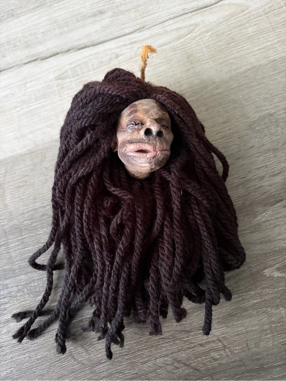 Shrunken head collectible from warner bros studio (England)